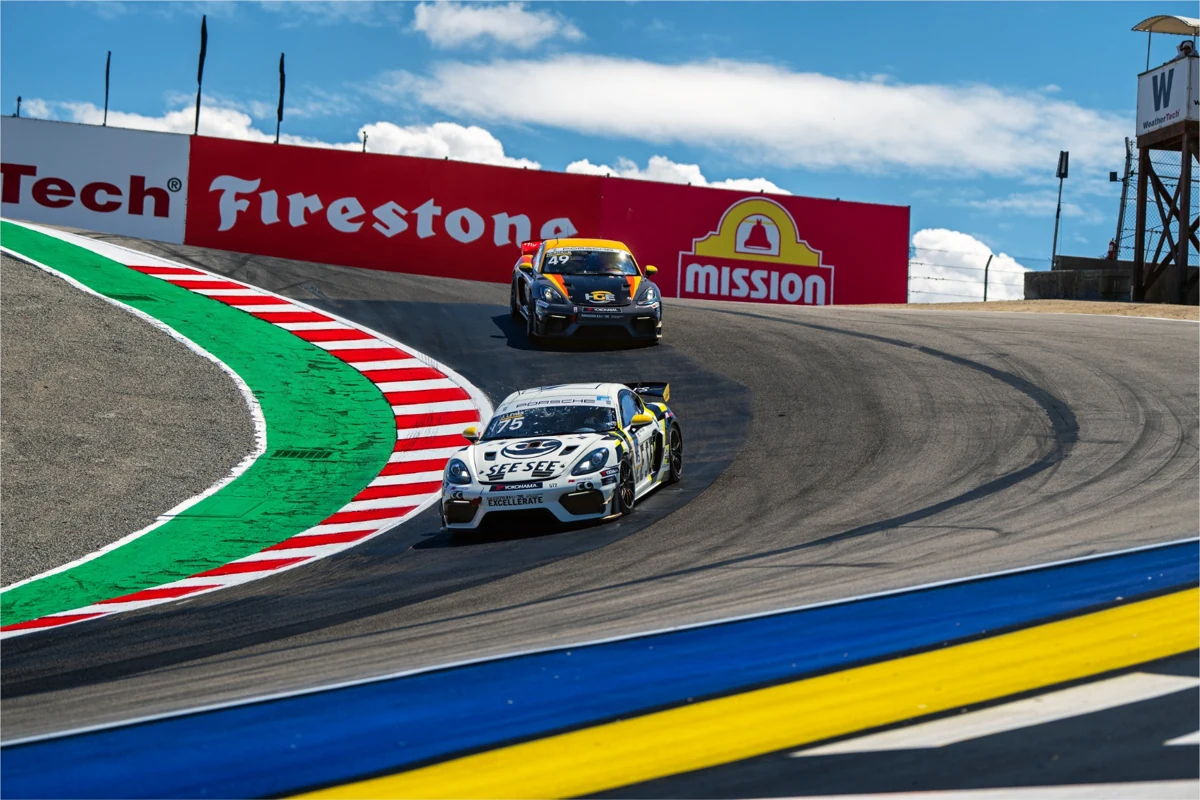 Porsche Sprint Challenge race cars descending the Corkscrew at Laguna Seca